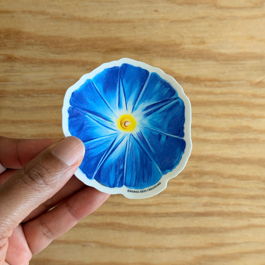 Blue Morning Glory Flower Vinyl Sticker on a wooden surface