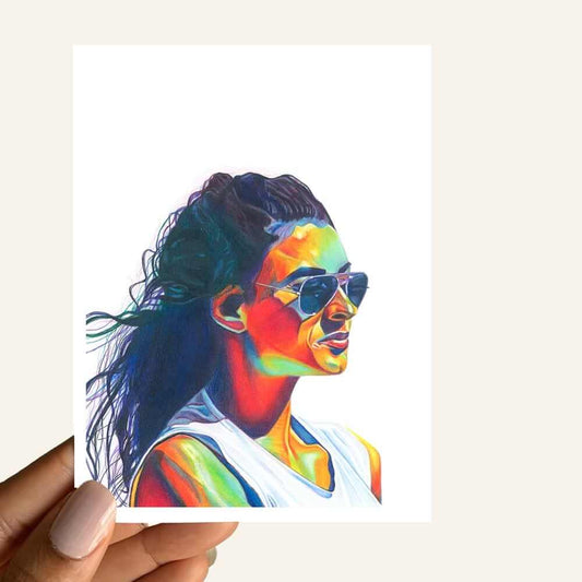 Festive Reflections of Joy Greeting Card featuring vibrant artwork of a woman in sunglasses looking into the distance.