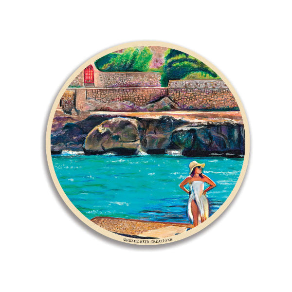 Mallorca Blues round ceramic coaster with the original art Carefree by Artist Renee Reid, cork backing, and absorbent stone for stylish functionality.