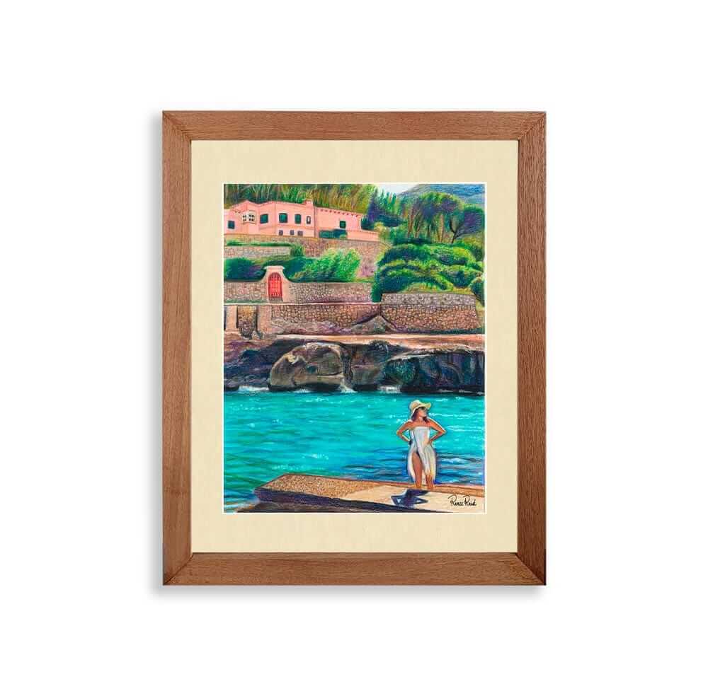 Renee Reid framed art print of a woman on a beachside landing glazing into the distance 