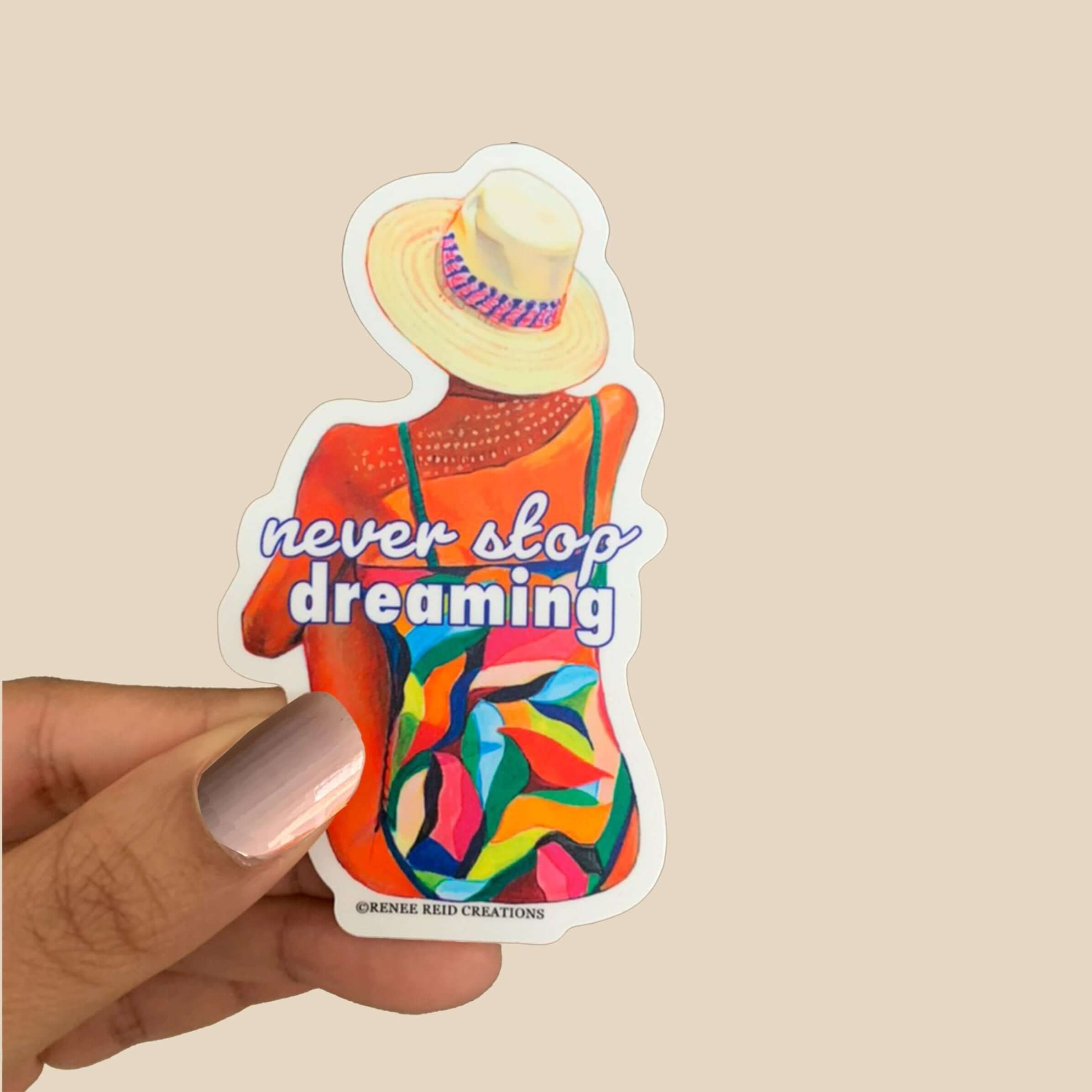 Mallorca Blues vinyl sticker with 'never stop dreaming' text, featuring a lady in a colorful swimsuit being held