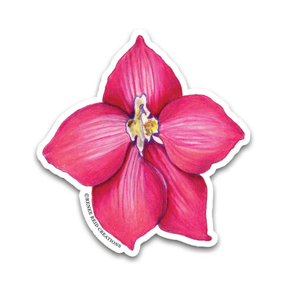A die-cut sticker featuring a vibrant magenta larkspur flower with a yellow and white center, shown on a plain white background. 