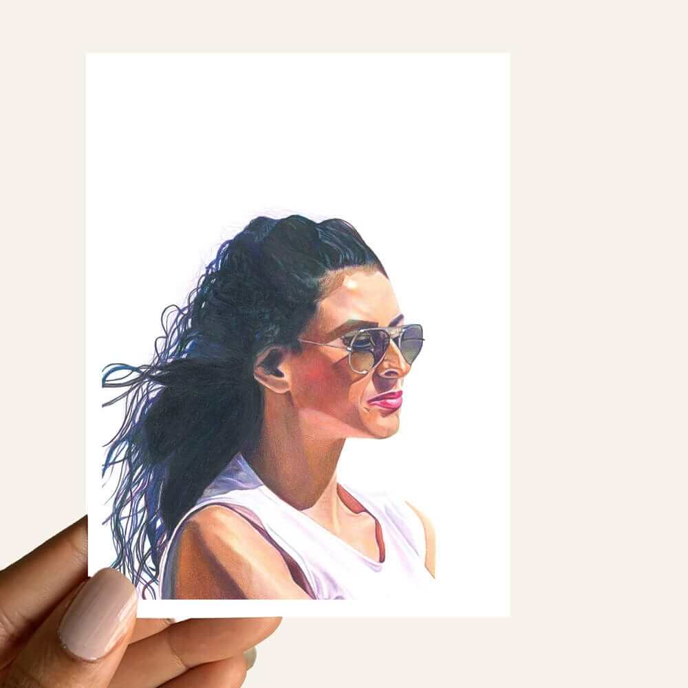 Close up of greeting card of  woman with a pensive look wearing sunglasses peering into the distance