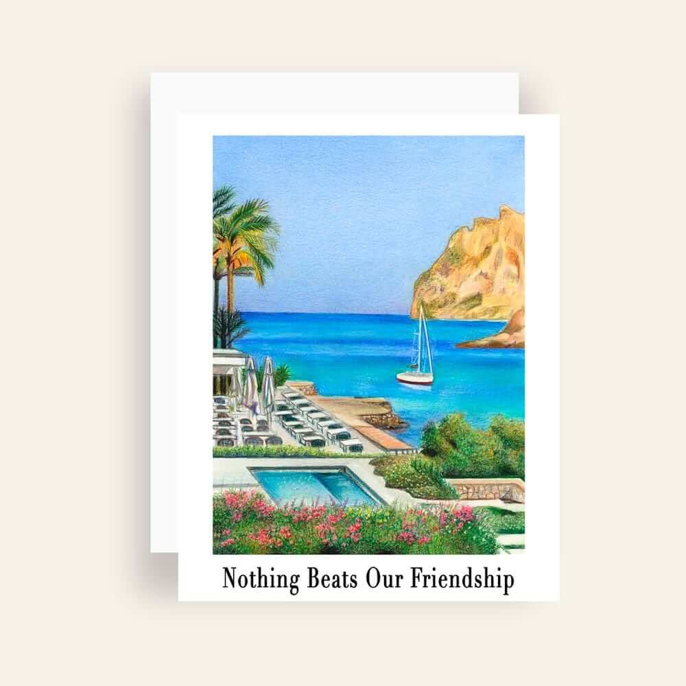 Close up of greeting card with generic text a view of an ocean resort with cliffs, beach, boats and palm trees 