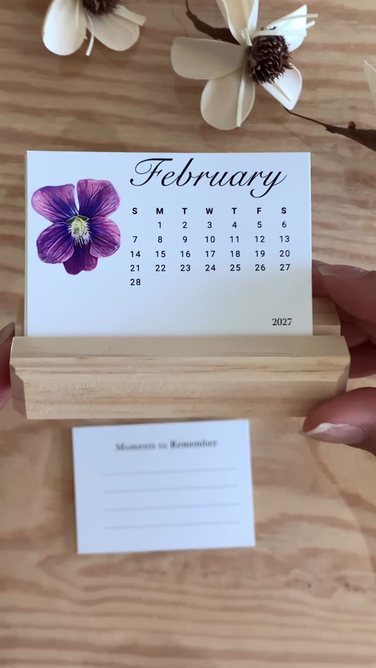Video showing how the 2027 Birth Flower Mini Desk Calendar cards flip from the monthly calendar to the writable Moments to Remember back
